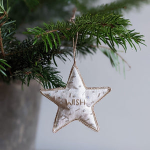 Christmas decorations, featuring a star with the word 'wish' on it