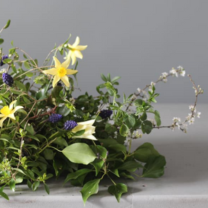 A photograph featuring Pod & Pip's funeral flower arrangements