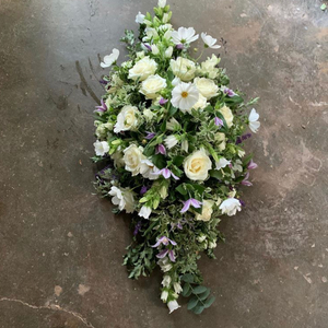 A photograph featuring Pod & Pip's funeral flower arrangements