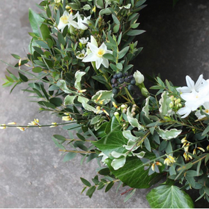 A photograph featuring Pod & Pip's floral funeral wreaths