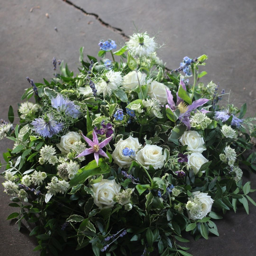 A photograph featuring Pod & Pip's funeral flower arrangements